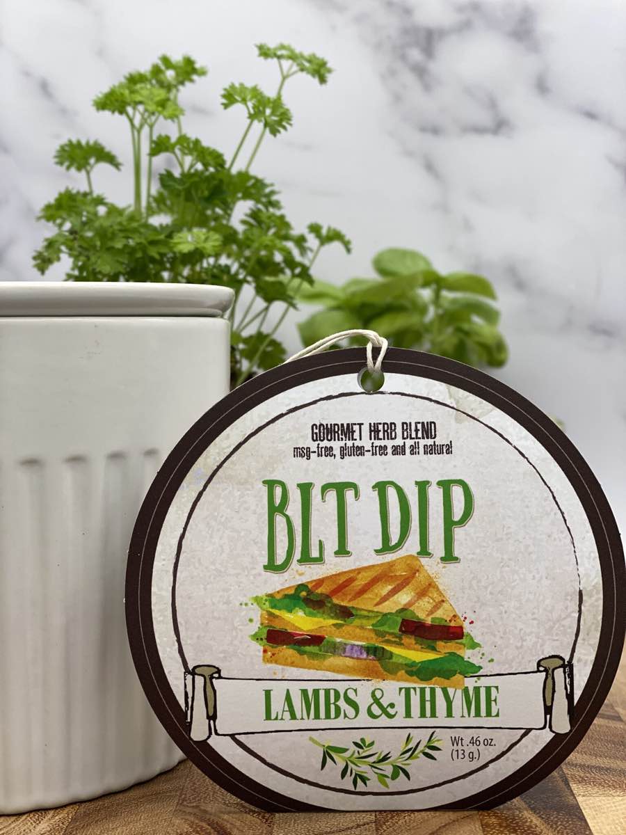 BLT Dip product package displayed with dip chiller on wooden cutting board