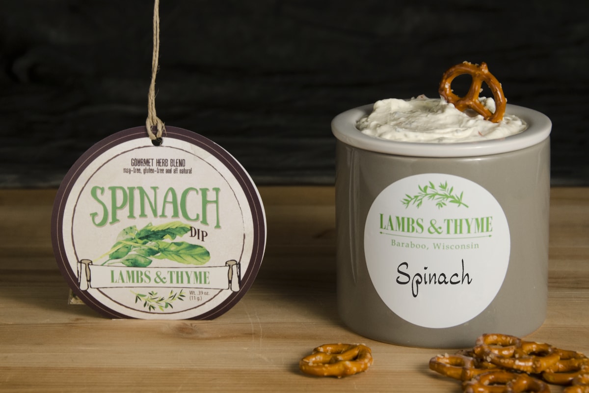 spinach dip package displayed next to dip chiller with pretzels
