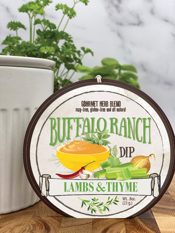 Buffalo Ranch Dip product package displayed with dip chiller on wooden cutting board